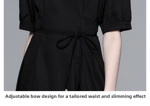 Gros plan du nœud papillon réglable à la taille sur une robe de luxe noire faite main