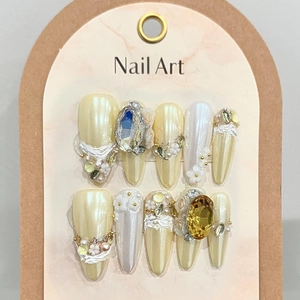 Handmade luxury gold press-on nails with rhinestones and elegant floral 3D art design