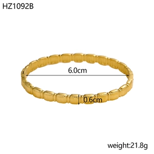 Detailed specs showing a 6cm diameter and 0.6cm width for the 18K gold plated bangle