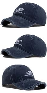 Détail d'une casquette en coton bleu foncé délavé avec broderie EPOWER et déchirures vintage