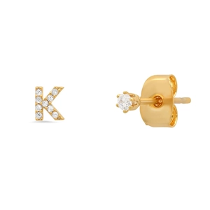 Detail view of gold letter K stud earrings with zircon inlay and butterfly backings