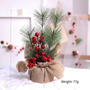 Mini artificial Christmas tree with red berries, pine cones, and burlap base, height 28cm