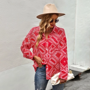 Red paisley print long sleeve shirt for women styled with casual ripped jeans and handbag