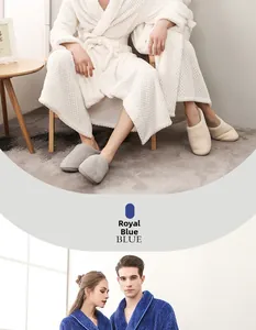 Detailed texture of thick waffle pattern bathrobe and plush slippers in home setting