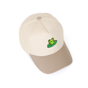 Close-up of the green frog on lotus leaf embroidery on a two-tone cotton baseball cap