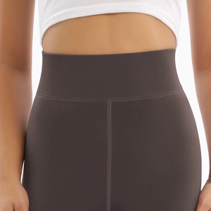 Detail of high waisted thermal leggings with wide ribbed waistband for tummy control