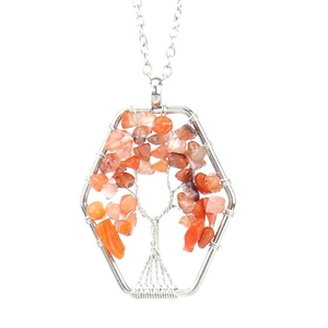 Detail showing handmade tree of life necklace with orange natural stones in hexagonal frame