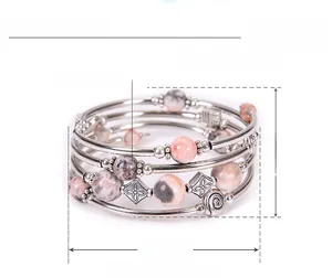 Detailed parameter view of a multi-layer boho wrap bracelet with pink stones and metal tubes