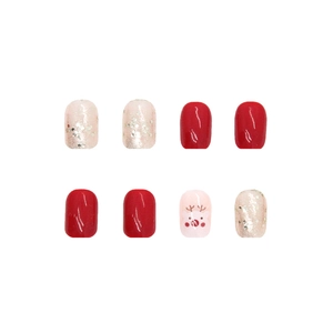 Christmas press-on nails featuring glitter white and red reindeer design for holiday style