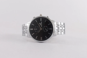 Detailed macro view of the ORLANDO men's quartz watch dial with silver stainless steel band