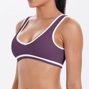 Vue latérale du soutien-gorge de sport violet avec bordure blanche et tissu élastique