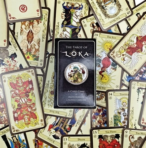 Macro view of Tarot of Loka card game box with Death and Sun cards displayed