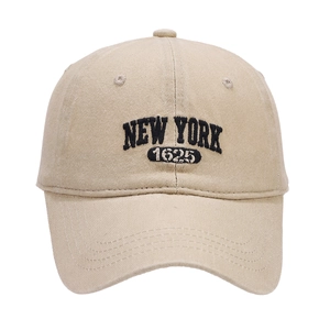 Classic khaki cotton baseball cap featuring black NEW YORK embroidery on a curved brim