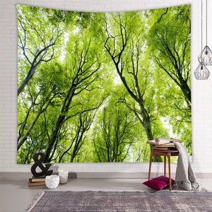 Detail of a large forest tapestry with lush green leaves on a white faux brick wall