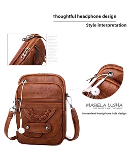 Detail of vintage brown PU leather shoulder bag featuring a built-in earphone hole and rivets