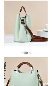 Detail view of mint green lychee grain handbag with brown leather handles and side profile