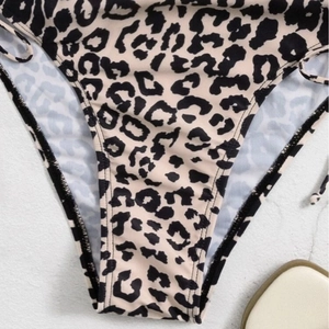 Chic leopard print bikini bottom with adjustable side ties and high-elastic fabric
