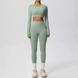 Front view of a sage green long sleeve crop top and high waist yoga leggings set