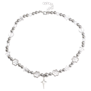 Detailed view of beaded necklace featuring silver star pendant and lobster clasp closure