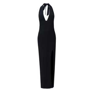 Detailed view of backless halter maxi dress with deep V-neck and high side slit
