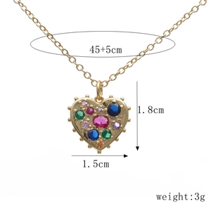 Detail view of heart pendant with colorful zircon stones and size measurements