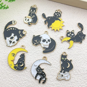 Set of eight black cat alloy pendants with moon and sun designs for DIY jewelry making