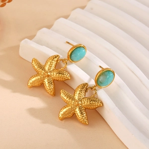 Golden starfish earrings with turquoise gemstones for summer beach vacation jewelry style