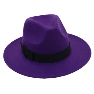 Detail view of purple wool fedora hat with a black ribbon band and vintage bow