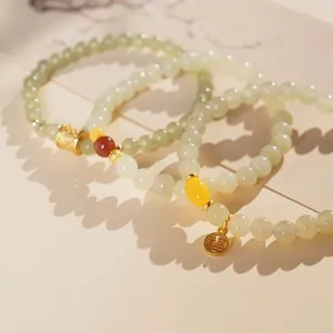 Three-piece retro Chinese style jade beaded bracelet set with golden Fu pendant