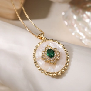 Elegant 18K gold-plated oval necklace with mother-of-pearl, green stone, and zircon
