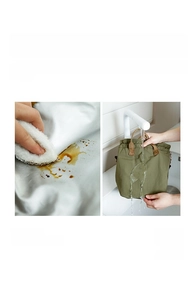 Detail of waterproof army green lunch bag showing easy wipe clean fabric and four pockets