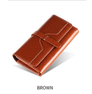 Detailed side view of high-grade brown leather long wallet with white stitching and strap buckle