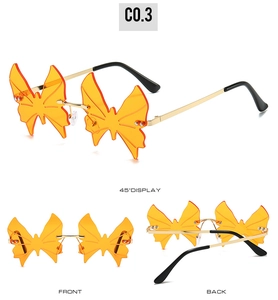Three-angle view of rimless butterfly sunglasses with orange lenses and golden frames