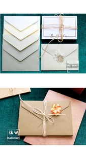 Flat lay of premium stationery set with envelopes, cards, hemp rope, and dried flowers