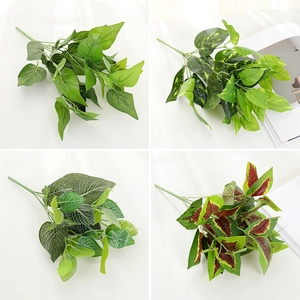 Collage of four artificial foliage styles including variegated and plain green leaves