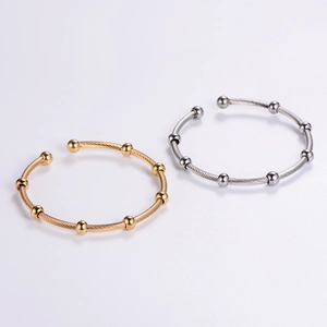 Adjustable stainless steel braided wire cuff bracelets in gold and silver with polished beads