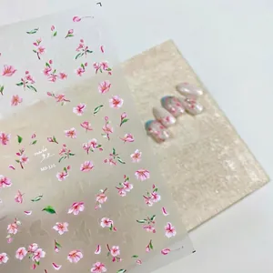 Stickers nail art fleurs de cerisier roses avec motifs floraux sur base transparente
