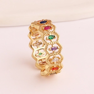 Close-up of a hollow honeycomb ring with colorful marquise-cut gems in gold plating