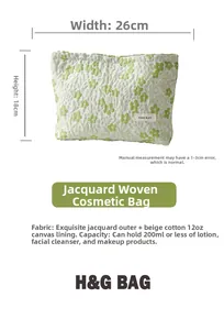 Detail view of light green jacquard makeup bag showing 26x18cm size and canvas lining