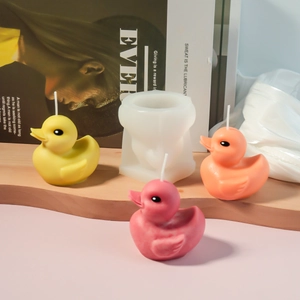 Detail of 3D little duck silicone mold with colorful handmade gypsum candle finished products