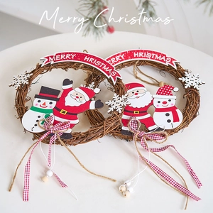 Two-pack Christmas rattan wreaths featuring Santa and Snowman with Merry Christmas signs