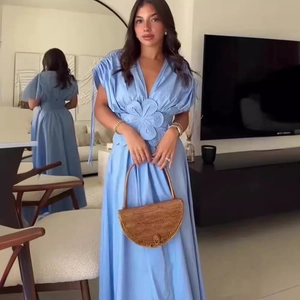 Light blue V-neck maxi dress with decorative 3D waist flower, front and back mirror view