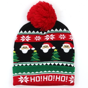 Weihnachts-Strickmütze mit Pompon und Weihnachtsmann-Schneeflockenmuster für den Winter