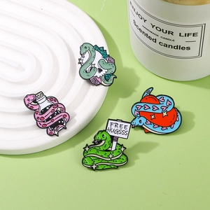 Set of 4 creative snake enamel pins featuring skulls, hearts, and roses on metal alloy