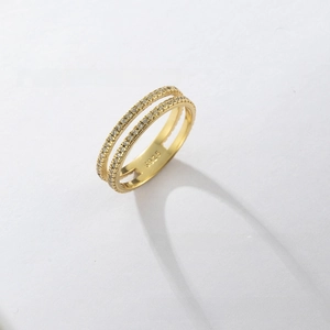 Close-up of S925 sterling silver stamp on the inner band of gold double-row ring