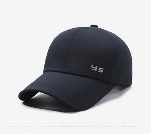 Detail of navy blue quick-dry baseball cap with side logo and laser-cut breathability holes