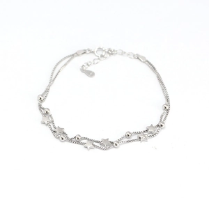 Dainty s925 silver double-layer bracelet featuring star and bead charms on a white background