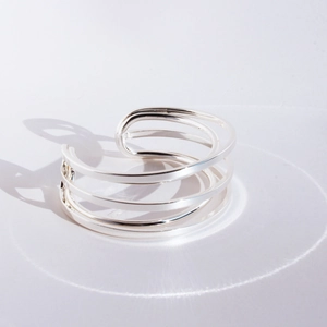 Minimalist silver multi-layer open cuff bracelet with sleek parallel geometric lines