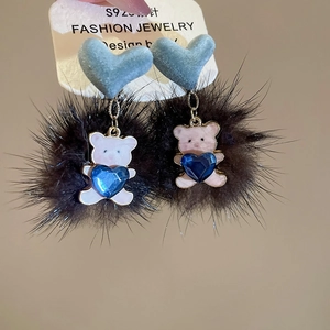 Detail of S925 silver needle earring with blue velvet heart, pompom, and bear charm