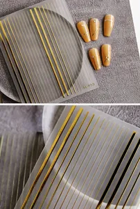 Macro view of M-055 metallic gold nail art stickers with 3D lines and geometric patterns